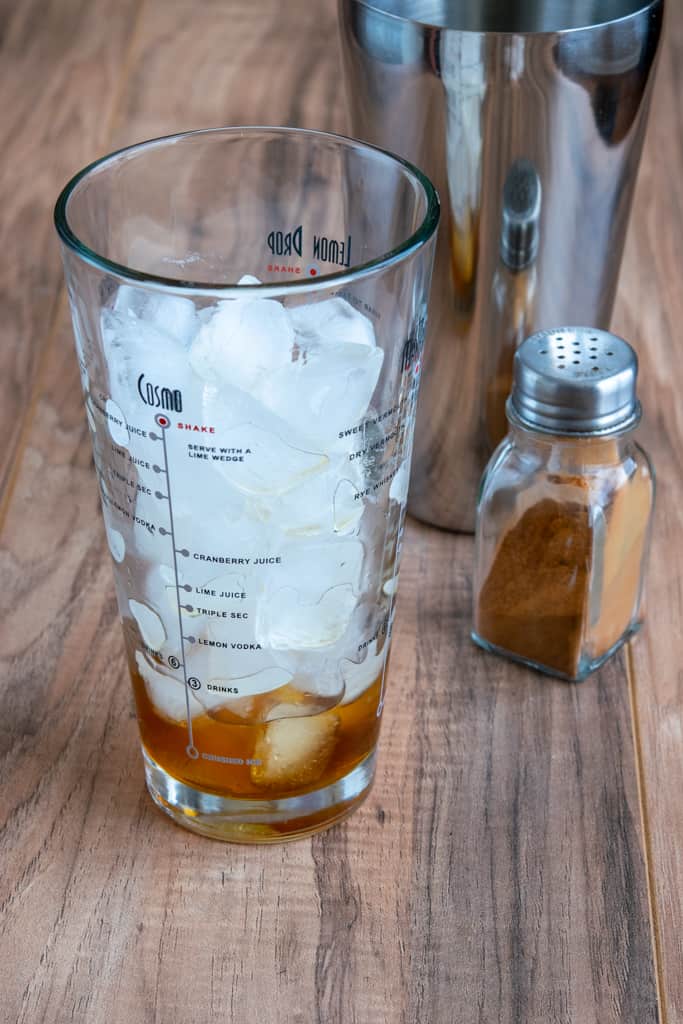 Shaker full of ice and brown sugar syrup to make a copycat Starbucks iced espresso drink.