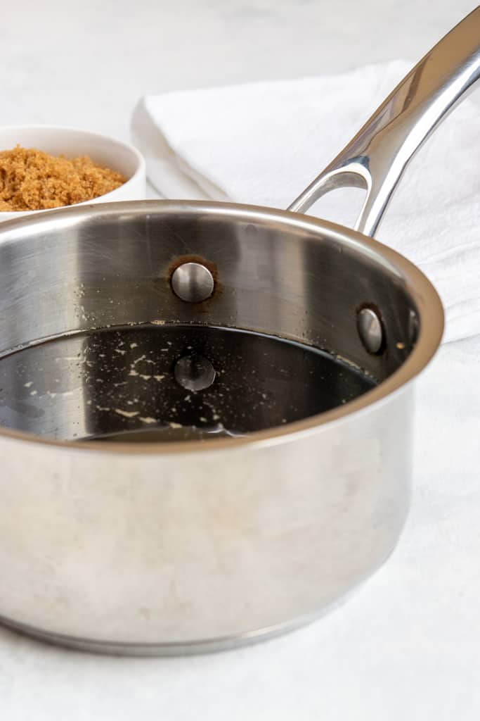 Homemade brown sugar syrup in pan.