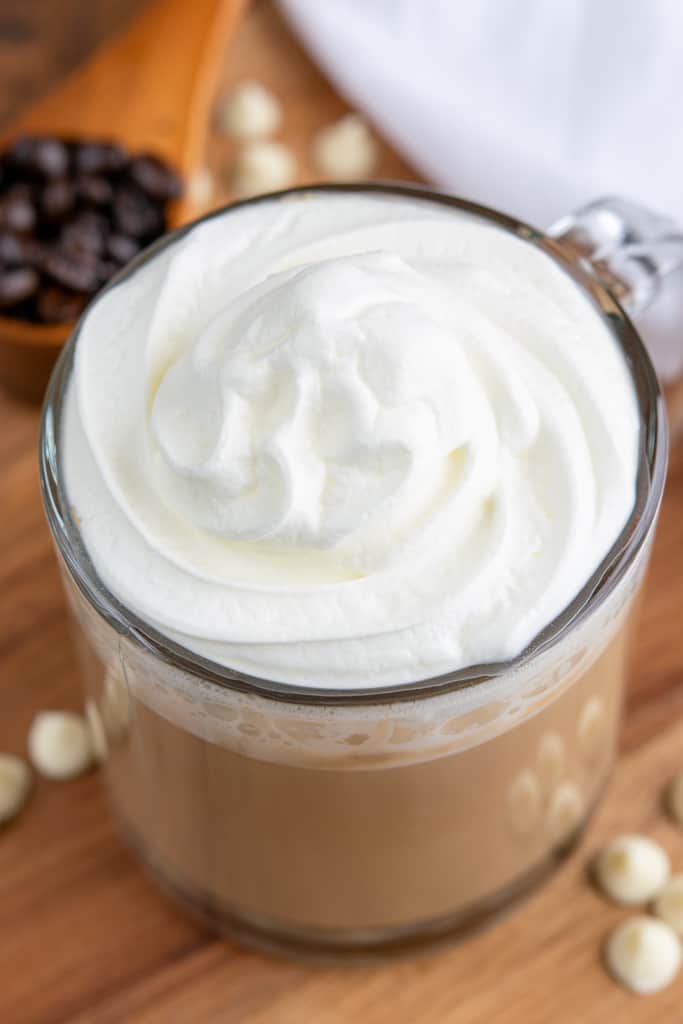 Sweetened whipped cream swirled on top of mocha.