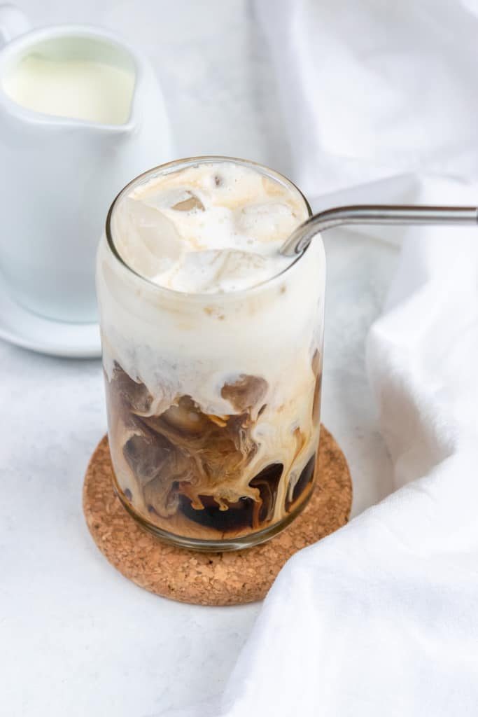 homemade vanilla sweet cream in a cup of cold brew coffee
