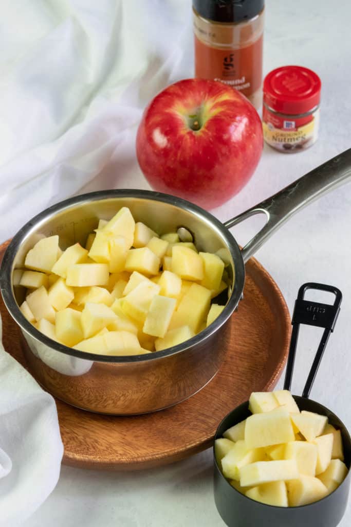 Cubed apples in a saucepan.