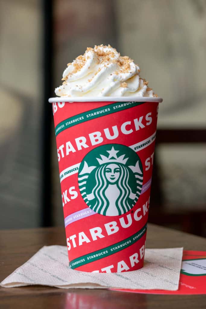 Starbucks Chestnut Praline Latte in a holiday red cup.