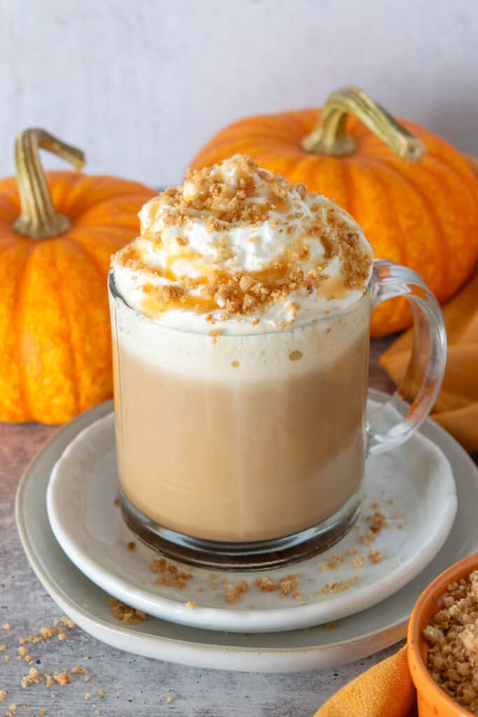 Homemade Pumpkin Pie Latte with spice pie crust topping and caramel drizzle.