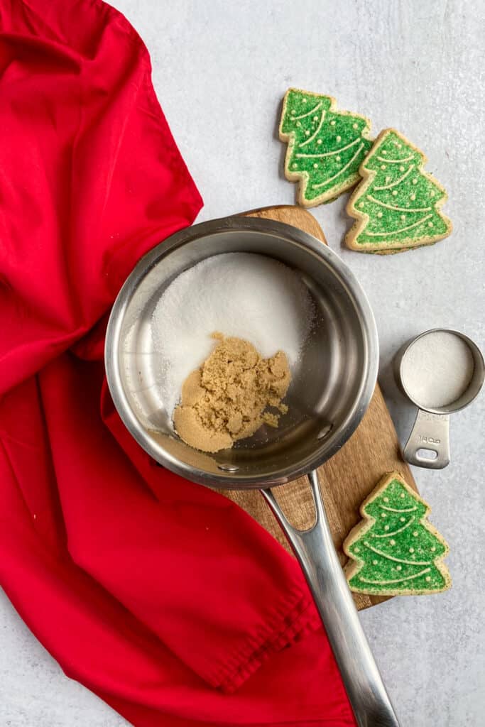 Granulated and light brown sugar in a saucepan.