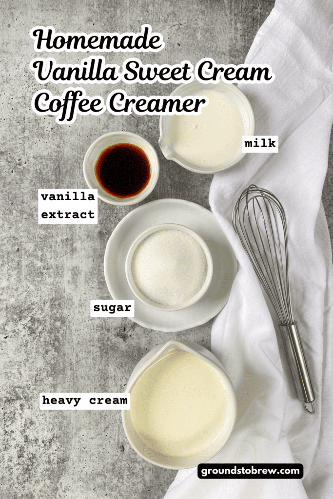 Overhead view of the ingredients needed to make homemade vanilla coffee creamer, including heavy whipping cream, milk, sugar and vanilla extract.